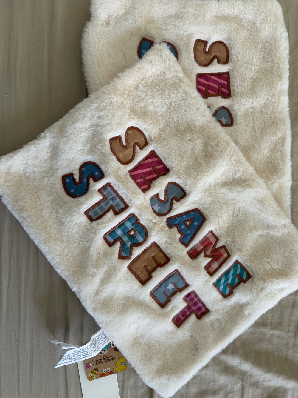 set of 2 Sesame Street Cream Plush Throw with Multicolor Appliqué Letters